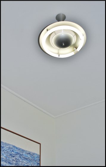 One of a series of original light fittings in the home.